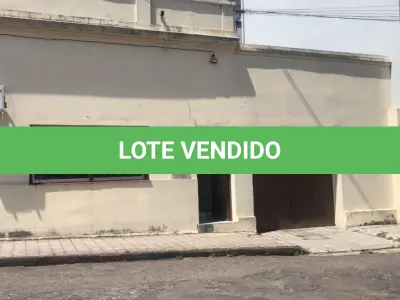 LOTE 006 - IMÓVEL URBANO composto por um terreno, medindo 10,9m de frente, com 22m de frente a fundos por ambos os lados e 10,9m de fundos, totalizando a área de 239,80m². Encontra-se no terreno um prédio de alvenaria com área total construída de 233,87m², sendo 142,89m² de residência propriamente dita (térreo) e 90,98m² de área de subsolo, designada pelo nº 1544 da Rua General Câmara, cidade de Santana do Livramento/RS. Inscrita sob a matrícula nº 30.505 do CRI de Santana do Livramento/RS.