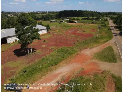 Área de terras medindo 4ha37a88ca, situado no 1º distrito do município de Santiago, no lugar denominado Rincão das Guabirobas. Conforme laudo de avaliação, foi edificado um prédio de alvenaria, pré-moldado, com aproximadamente 2.000m² de área construída, semi acabado, faltando colocação de aberturas e piso, ainda não averbado na matrícula. Inscrito sob a matrícula nº 28.489 do CRI de Santiago/RS.