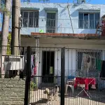 LOTE 001 - IMÓVEL URBANO composto de um terreno, situado na Rua Vasco Alves, nº 1531, medindo 396m² e um prédio de alvenaria. Conforme laudo de avaliação, constam no terreno mais três construções não averbadas na matrícula, sendo duas casas e um centro religioso.