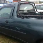 LOTE 001 - Um veículo FORD/COURRIER, ano/modelo 1999/2000, cor verde, placas CYV8C68, em mau estado de conservação